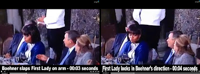 Boehner slaps First Lady's arm.