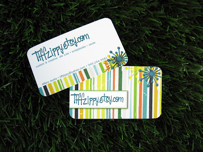 customer business cards on grass, printed by GotPrint