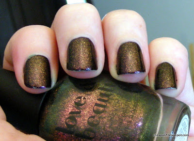 Swatch of Love & Beauty in Emerald (dupe for Cult Nails Masquerade) over Revlon Parfumerie in Wild Violets