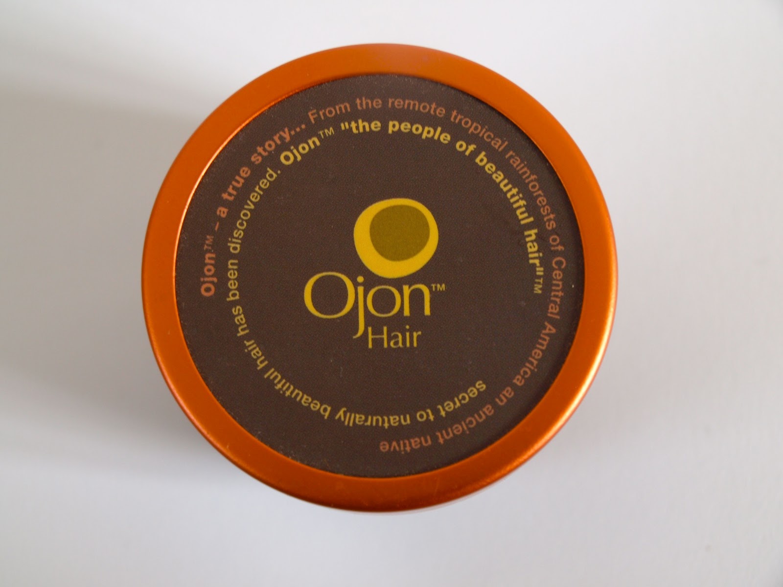You can't fax glitter Ojon Restorative Hair Treatment