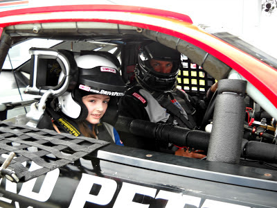 Katarina in a race car
