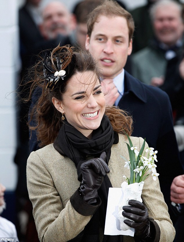 kate middleton red. All smiles: Kate waves to the