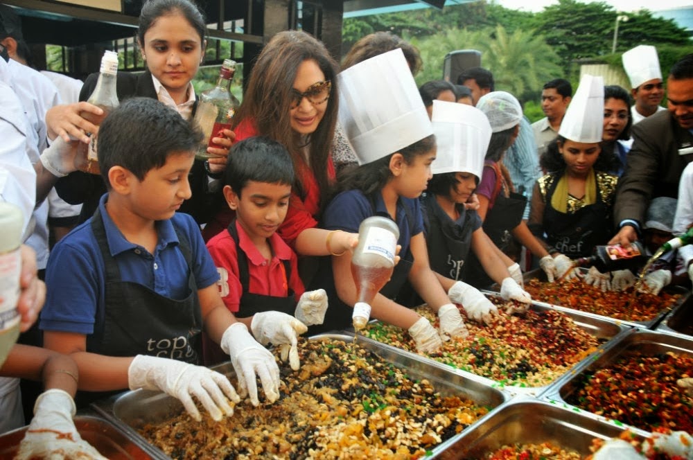 Mahesh Babu Family at Cake Mixing Event - Cinema65.com