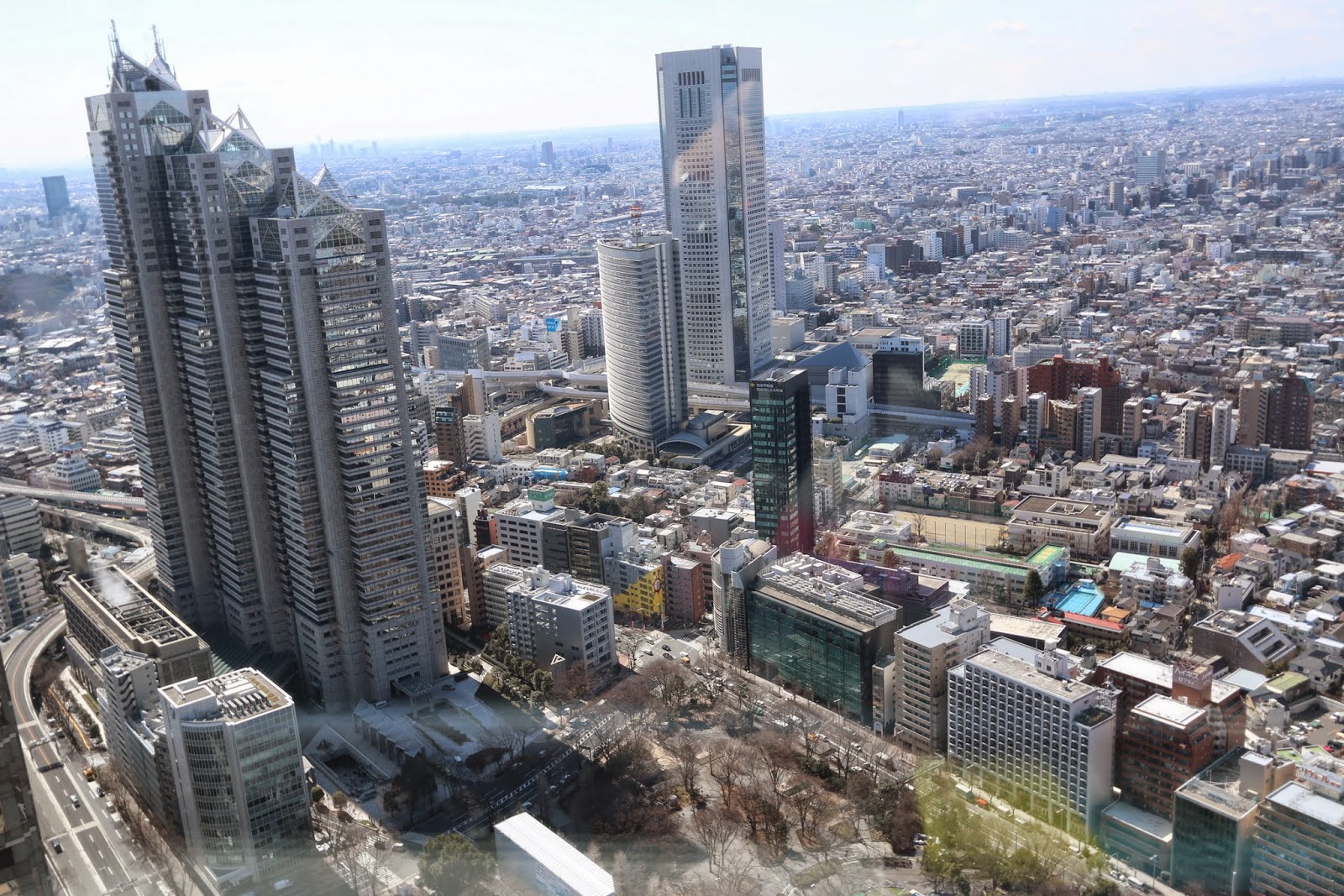 Shinjuku Park Tower and Tokyo Opera City Tower can be seen at observation deck, Tokyo Metropolitan Government Building in Shinjuku, Tokyo Shinjuku Park Tower and Tokyo Opera City Tower can be seen at observation deck, Tokyo Metropolitan Government Building in Shinjuku, Tokyo