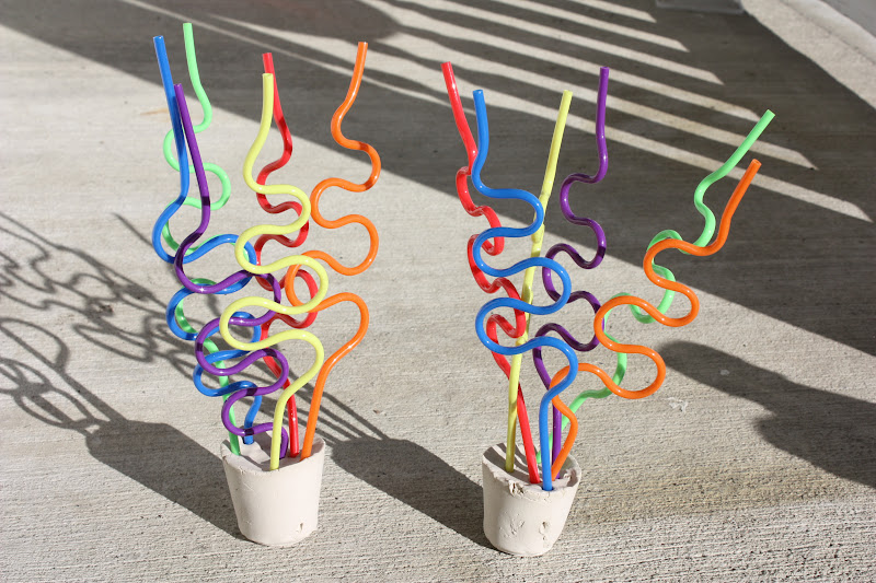 Puddles and Mud Modern Art Sculptures plastic swirly straws