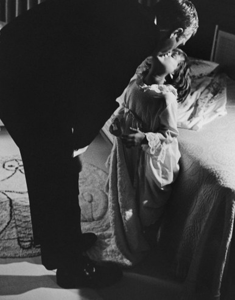 Steve McQueen and daughter. 1963.