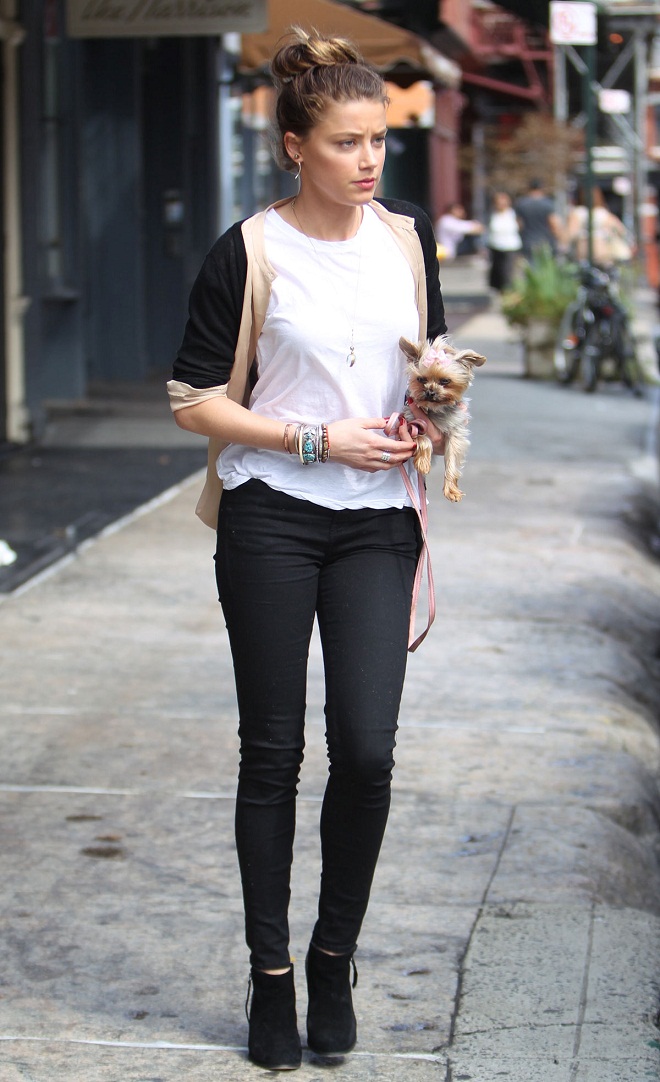 Amber Heard flaunts a chic casual style in New York while carrying her dog