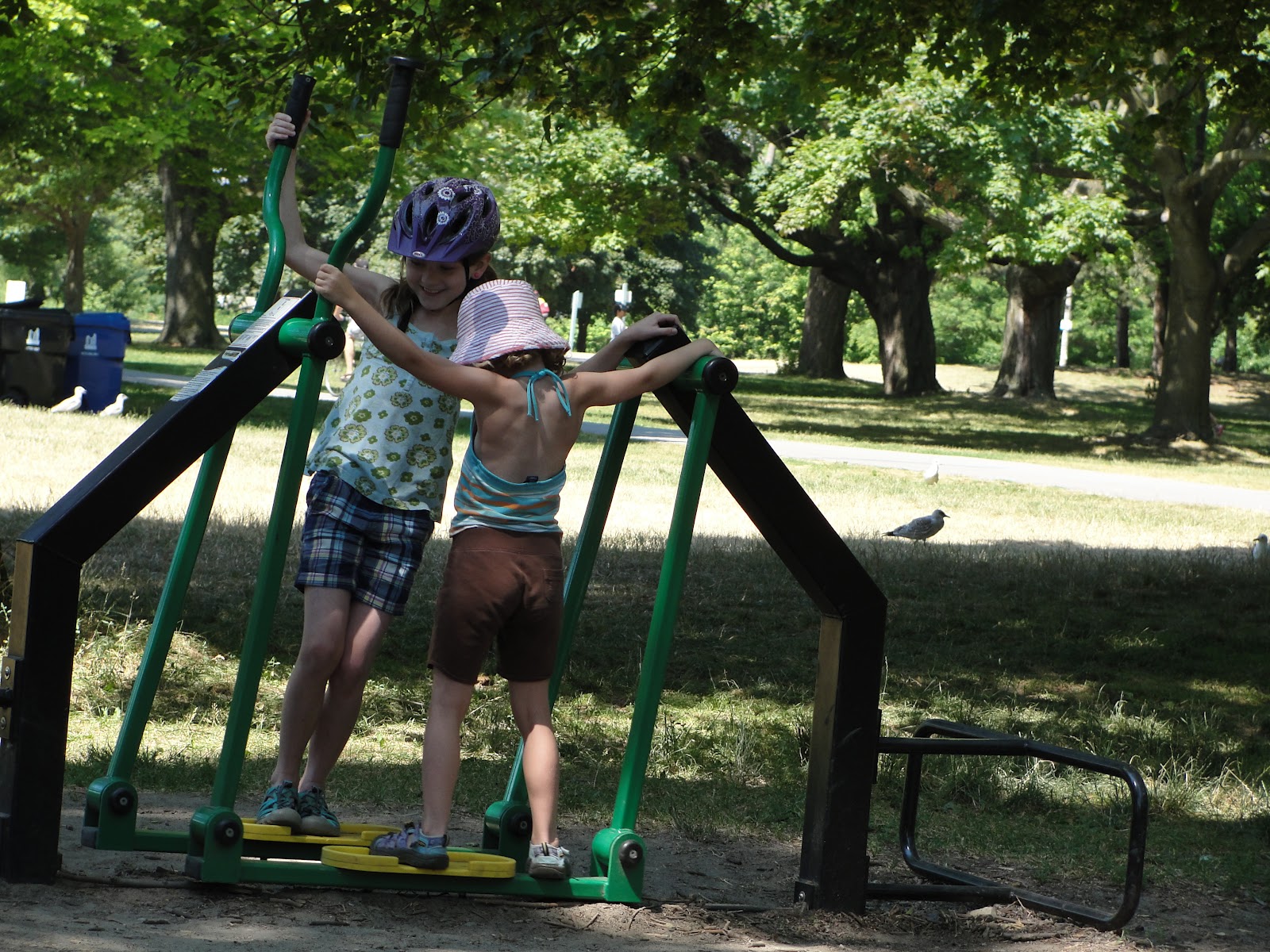 Outdoor Play Party kids riding on 2 wheels