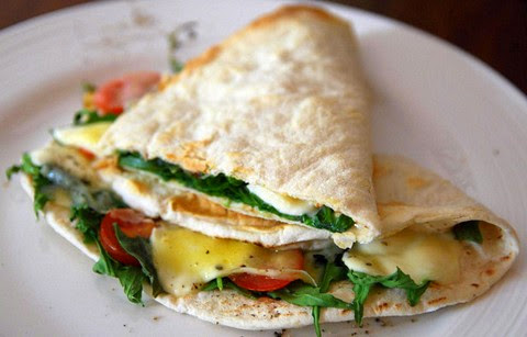 Pecorino and Mozzarella Stuffed Flat Bread with Cherry Tomatoes and Basil