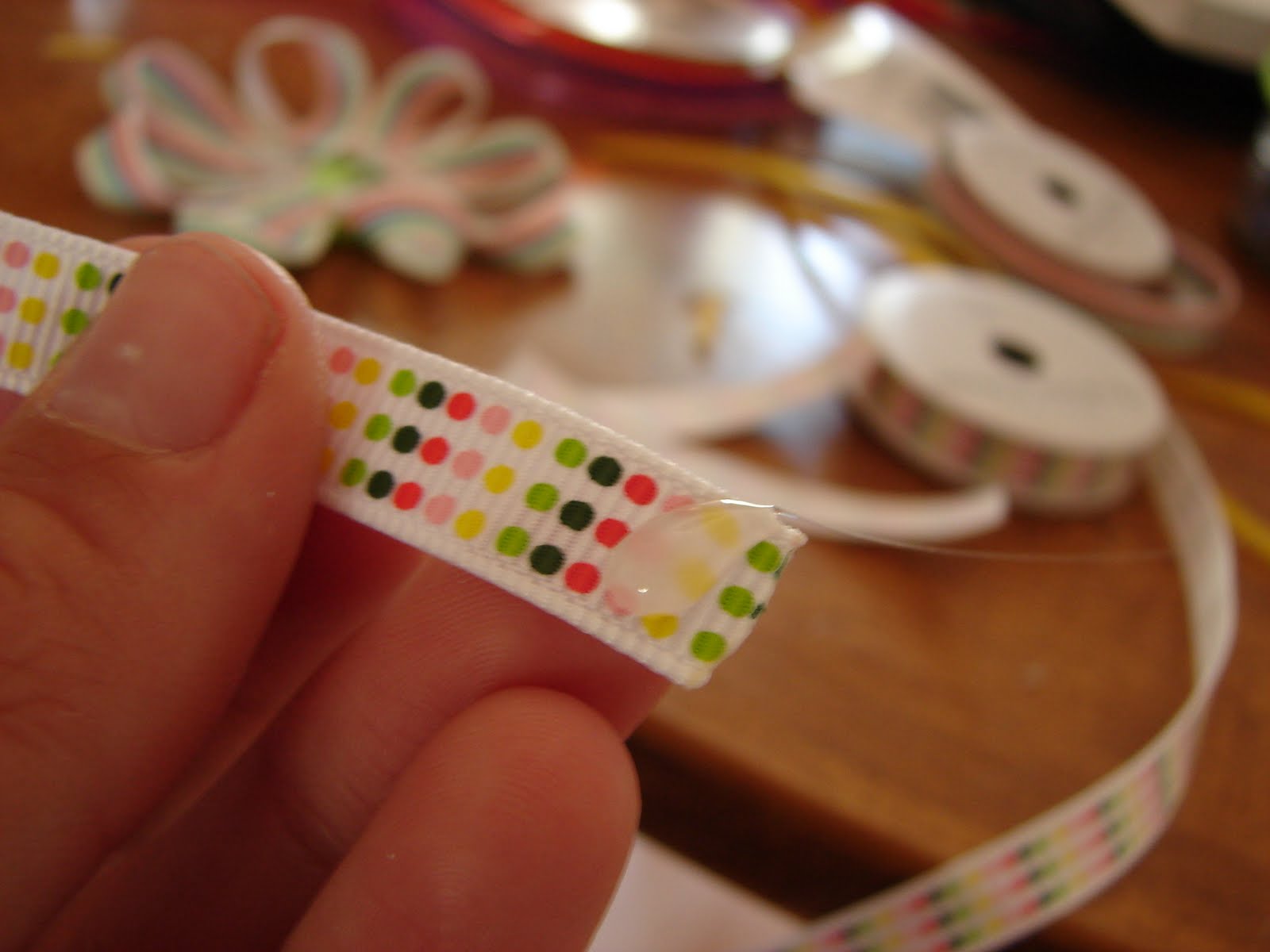 A girl and a glue gun fun with ribbons!!!!