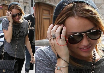 miley cyrus tattoo pictures. Miley cyrus gets third tattoo.