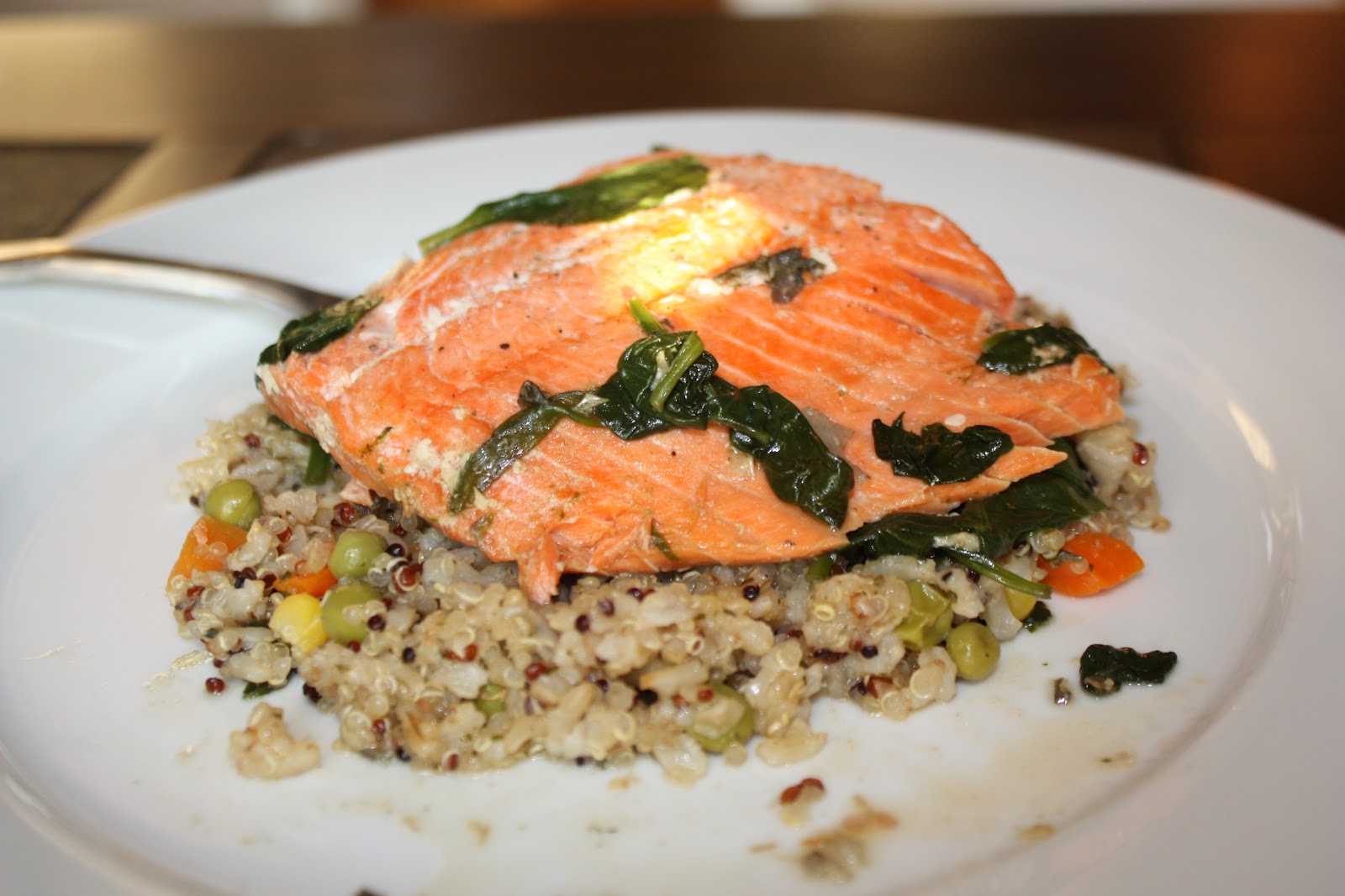 Chow and Chatter Salmon with Sauteed Spinach over Quinoa