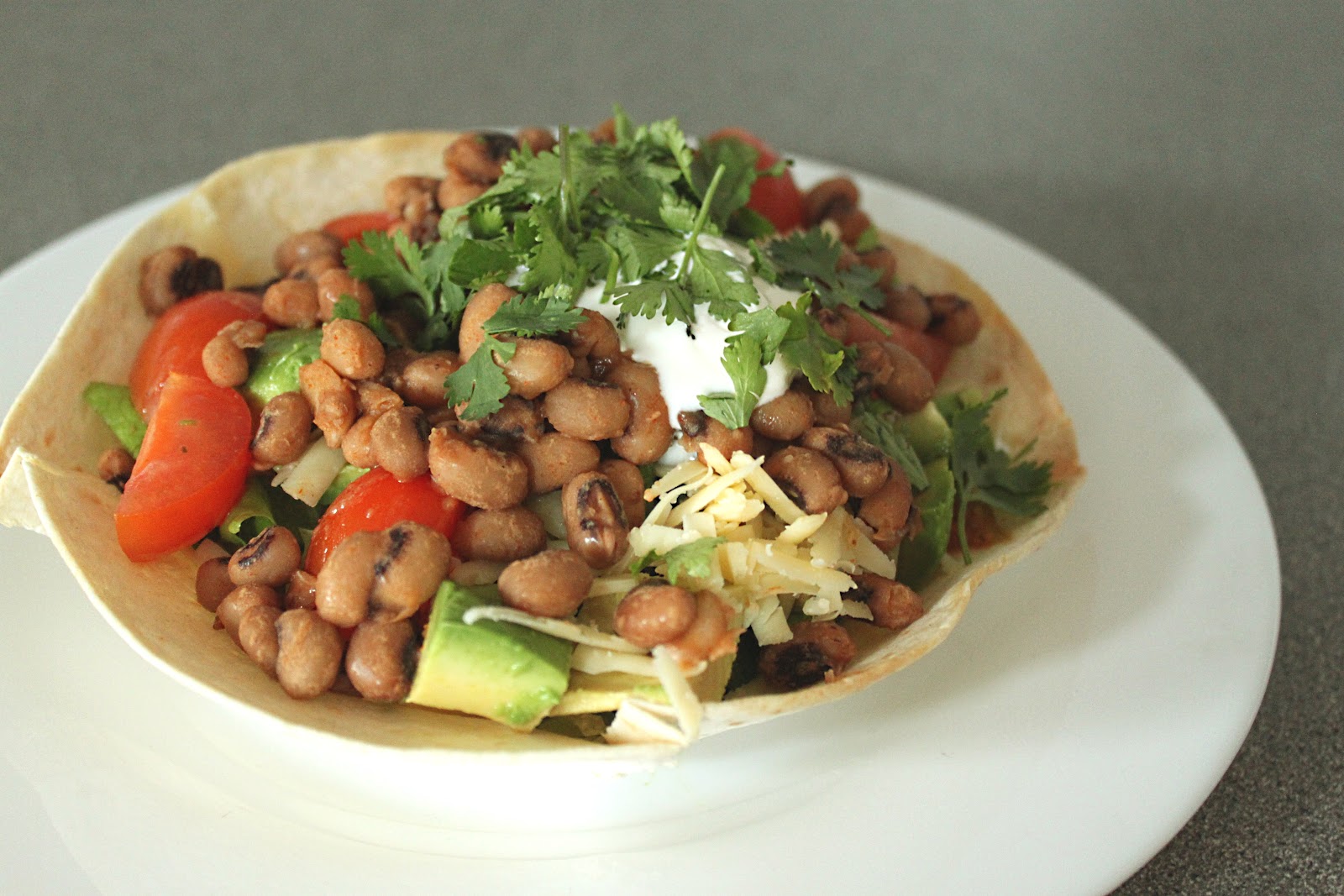 Taco salad in a baked tortilla bowl Amuse Your Bouche