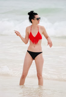 English: Krysten Ritter Red Bikini American Football Tulum Mexico