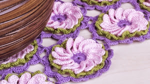 Flor tejida al crochet con diagrama