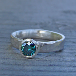 green moissanite ring