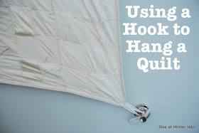 using hooks to hang a quilt