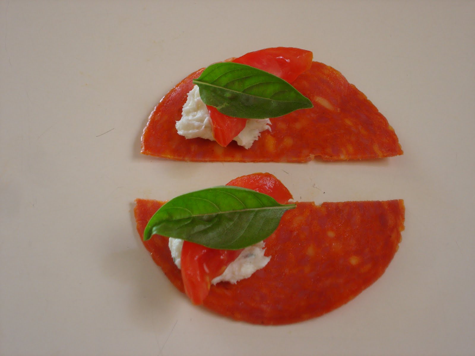 woman with wings pepperoni appetizers