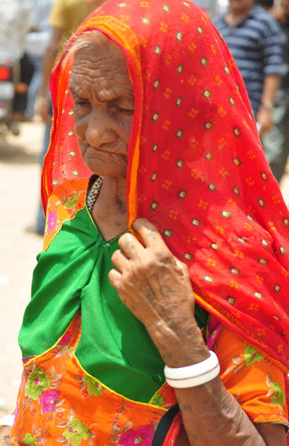 portrait indian tribal old woman women girl tarnetar gujarat fair festival colourful face