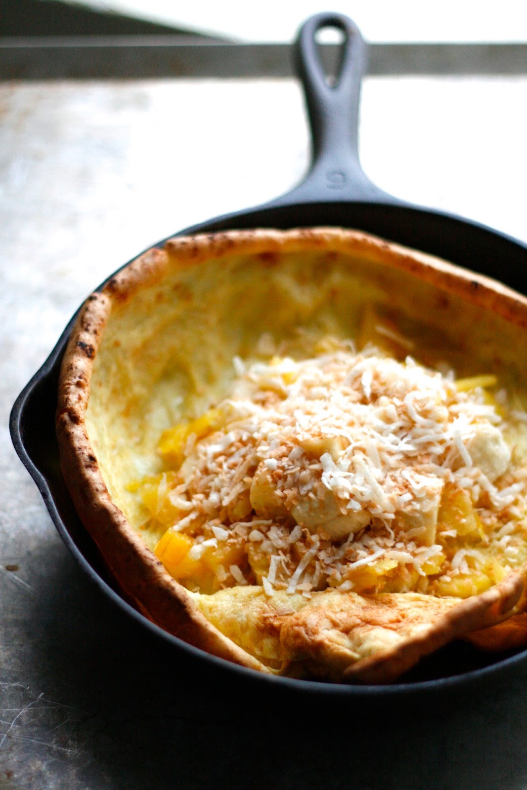 Indigo Scones Brown Butter Coconut Dutch Baby with Bananas and Pineapple