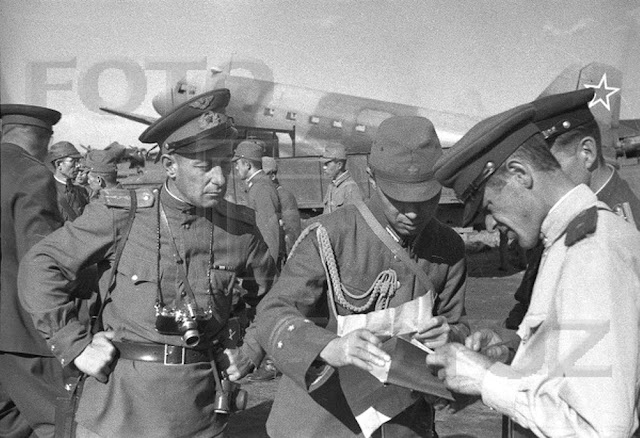 A Japanese soldier surrenders to the Russians in 1945