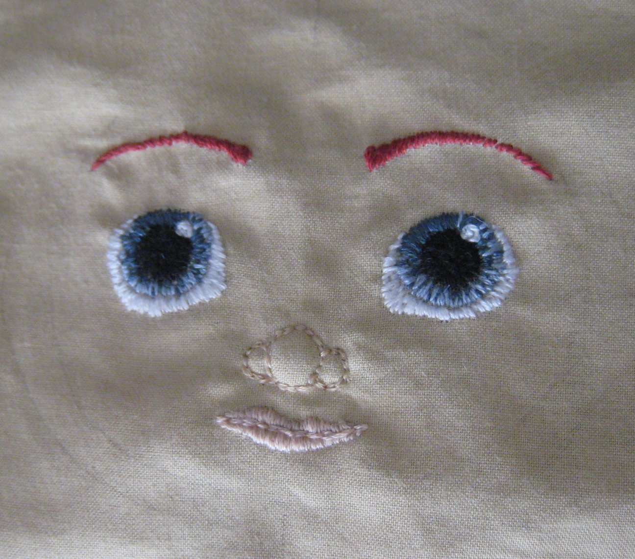 Corsetra Designs Embroidering eyes