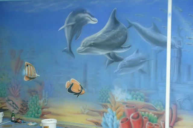 Wystrój ści9an na basenie, mural wykonany na basenie, malowanie rafy koralowej