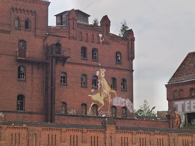 Street art work of a crazy dear on a beer factory wall near treptower park in Berlin