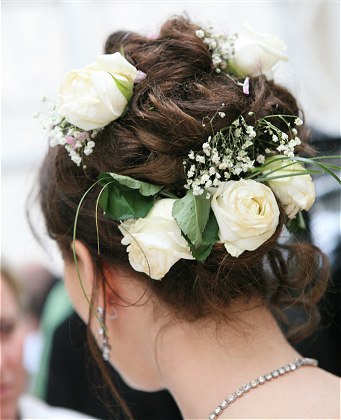 Beautiful and pretty Up do Wedding Hairstyle with white flower design Beautiful and pretty Up do Wedding Hairstyle with white flower design