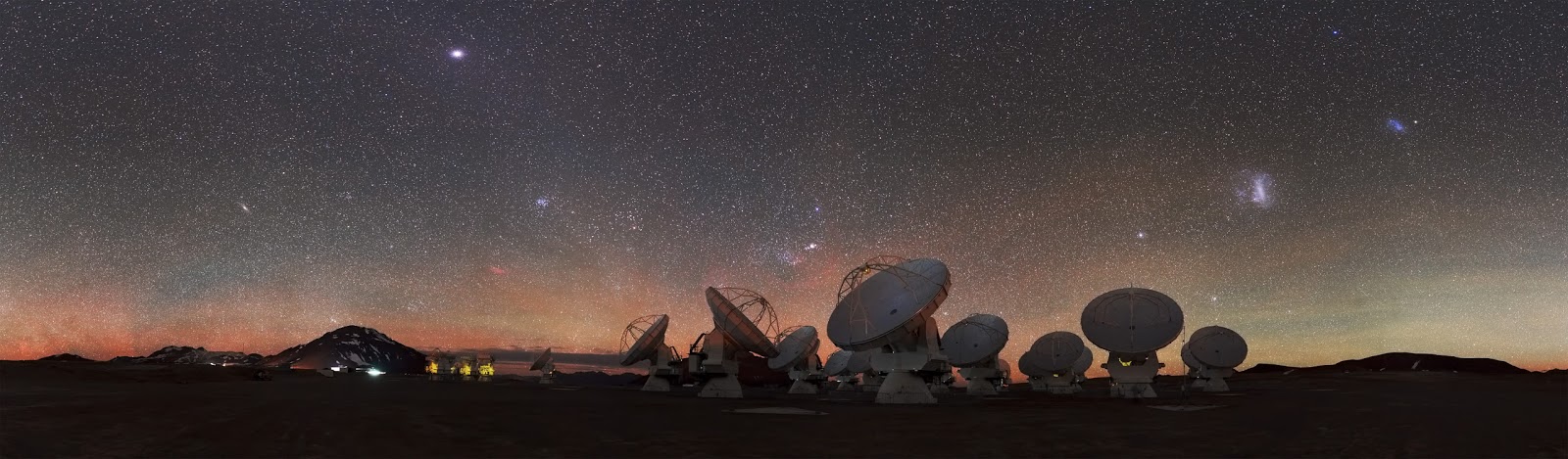 In Search of Space In Search of Space   At 5000 metres above sea level, high upon the Chajnantor Plateau in Chile, the antennas of the ALMA Observatory peer skywards, scanning the Universe for clues to our cosmic origins. This plateau is one of the highest observatory sites on Earth.  Visible amongst the thousands of stars on the right side of this image are the Small and Large Magellanic Clouds, appearing as luminous smudges in the sky. These cloud-like objects are both galaxies — two of the closest galactic neighbours to our galaxy, the Milky Way.  ALMA's main aim is to observe the coldest and most ancient objects in the cosmos — known as the "cold Universe". The array measures radiation emitted in the millimetre and submillimetre wavelengths, which lie in between infrared and radio waves in the electromagnetic spectrum. It features 66 mobile antennas which can be moved and configured over the ALMA site to meet the scientists' requirements, making it the biggest astronomical experiment in existence.  This amazing picture of the ALMA landscape was taken by ESO Photo Ambassador Stéphane Guisard, an optics engineer at the European Southern Observatory's Very Large Telescope in the Atacama Desert, Chile.  Image Credit: ESO/S. Guisard Explanation from: http://www.eso.org/public/images/potw1431a/