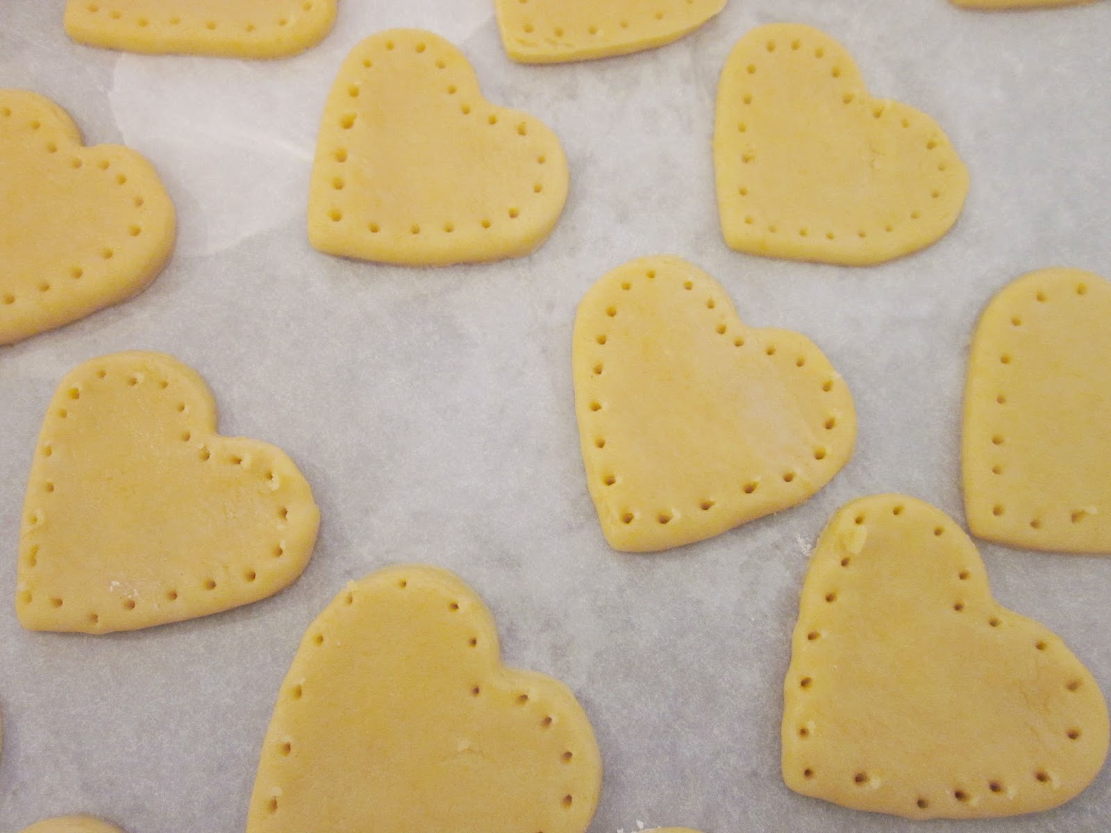 Heart-shaped biscuits on tray