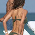 Claudia Galanti strikes a pose in a Green BIkini as she enjoys a vacation in Miami