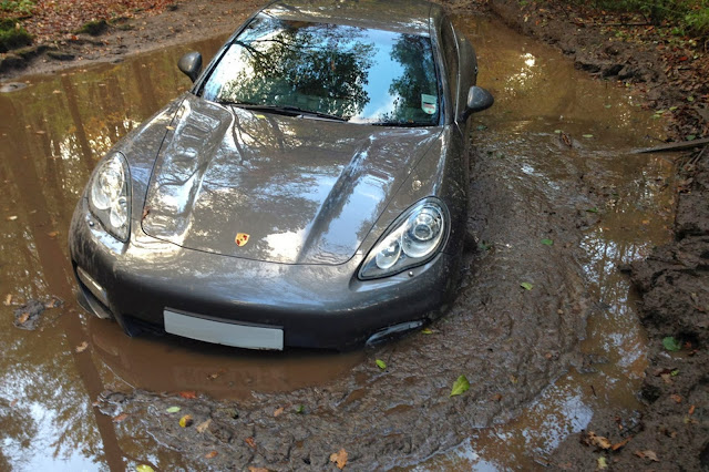 Andre Wisdom drove this Porsche Panamera into a muddy pit