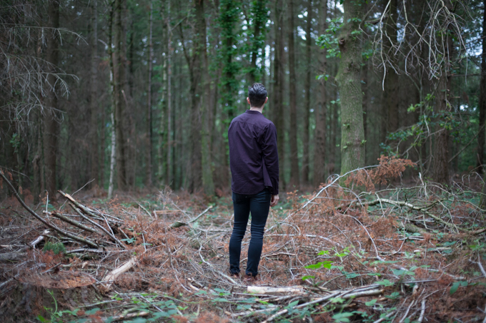 girl and guy in the forest at twilight
