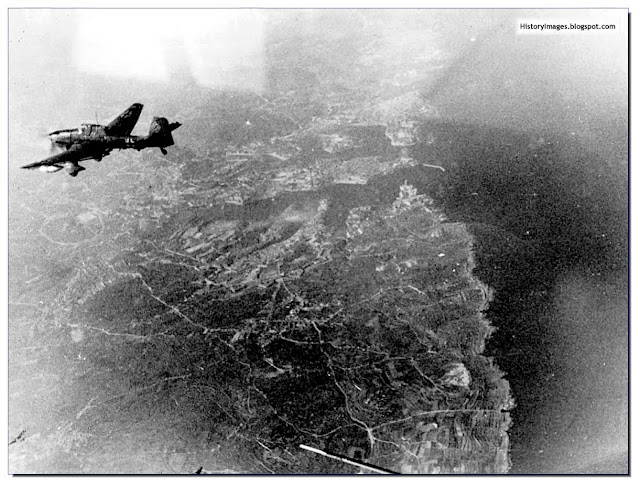 German Stuka Dive Bomber flies over Valletta, the capital of British Malta in 1941