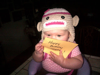 Cute baby in a monkey hat