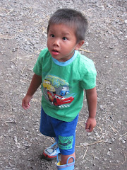 Alexandre getting ready to feed the animals at Linda's