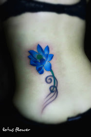 bright blue lotus flower tattoo
