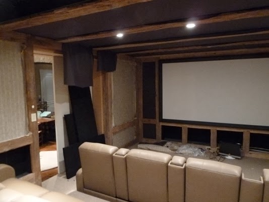 in wall speakers behind projector screen