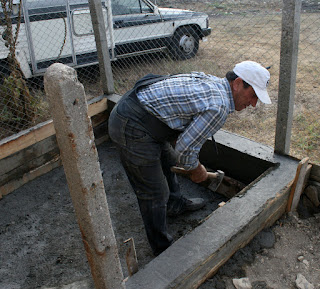 Back to work on the pond; removing the wooden frame Back to work on the pond; removing the wooden frame