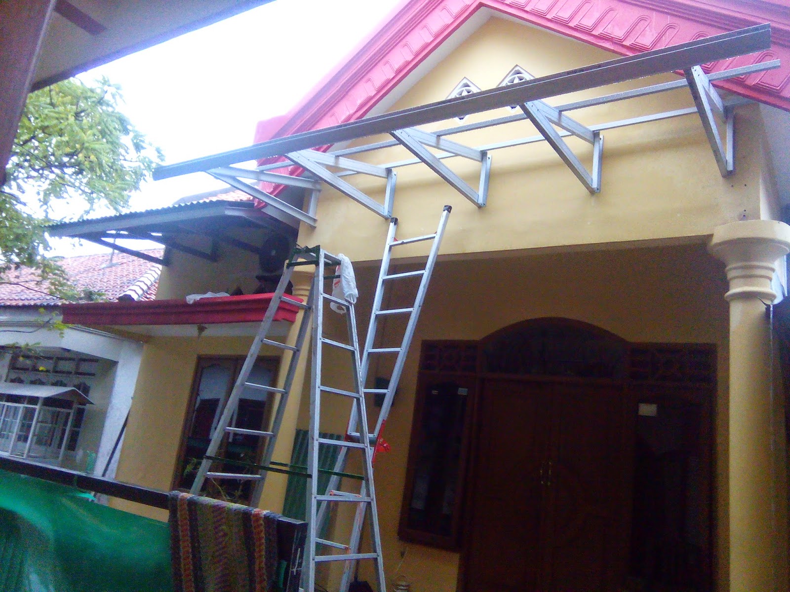 KENAPA PILIH KANOPI BAJA RINGAN KENAPA PILIH KANOPI BAJA RINGAN