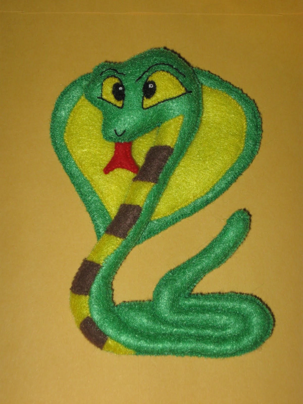 Fans of Carolyn DeAngelis Felt Ornaments: King Cobra