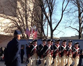 <img src="image.gif" alt="This is 57th Presidential Inauguration Parade Colonial Army" />