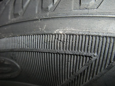 cracked, cut, tire sidewall, popped tire, hole