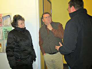 UATP staff talks to Rod Price (center) from the School of the Deaf and Blind.