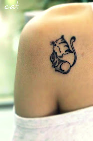 comic style cat tattoo on the back