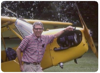 Photo of Frank B. Baker and his J-3 Piper Cub