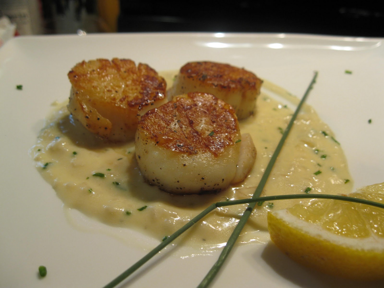 fatback and foie gras: pan-seared scallops with chive beurre blanc fatback and foie gras: pan-seared scallops with chive beurre blanc