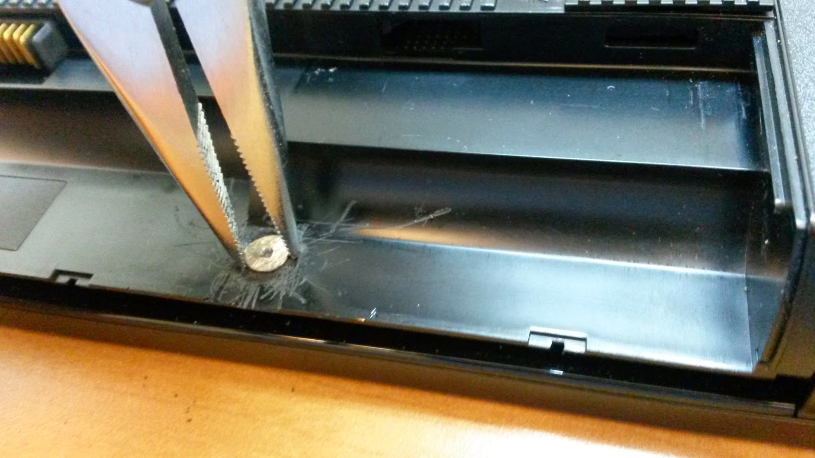 Flybyknight's Blogspot How to Remove a Stripped Screw from a Laptop