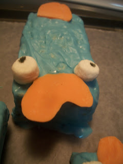 real platypus with birthday hat real platypus with birthday hat
